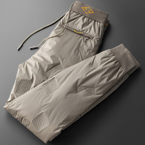 Pantalon dextérieur épais en duvet doie blanc imperméable et résistant au froid pour hommes et femmes en hiver.