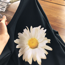 (Da Feng Feng)Dark daisies The sun shines quietly  on the back Black long-sleeved T-shirt women loose