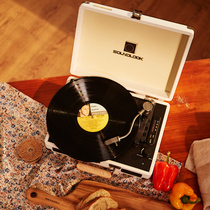 Vinyl record player Modern portable old-fashioned electric phonograph LP retro portable Bluetooth radio sound living room Europe