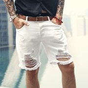 Mùa hè 2019 phong cách mới màu trắng nam phá vỡ quần jeans lỗ quần nam lỗ denim K772 - Quần short