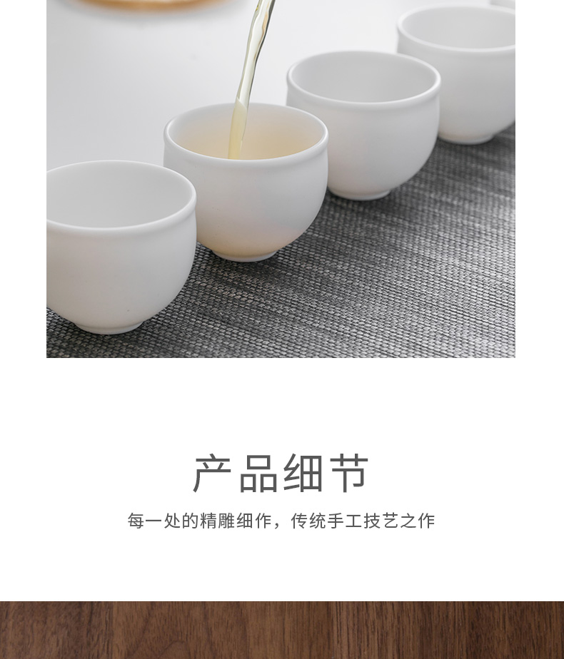 And creation of dehua white porcelain tea tea set suit household contracted hand grasp pot teapot is a complete set of tea cups