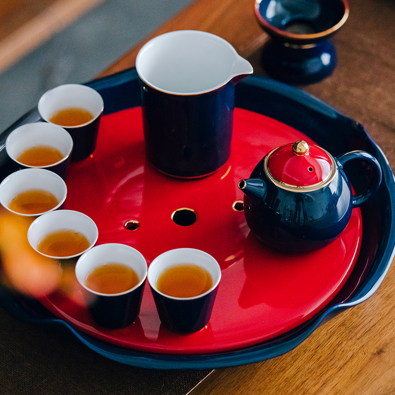 A complete set of kung fu tea set household contracted large set of ceramic cups zen tea tea tray was sitting room office