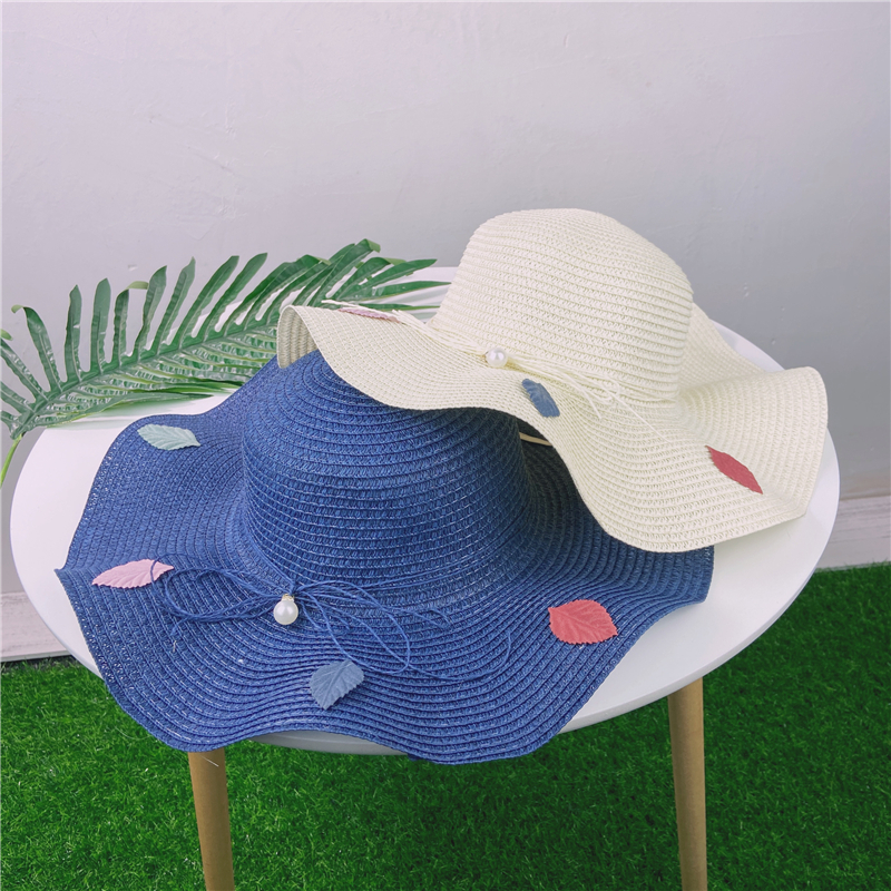 Fashion Pearl Bow Straw Hat Summer Travel Beach Hat display picture 2