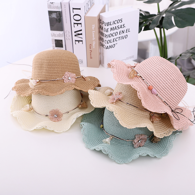 Fashion Flower Decoration Solid Color Children's Summer Beach Hat Sun Hat Straw Hat Wholesale display picture 1