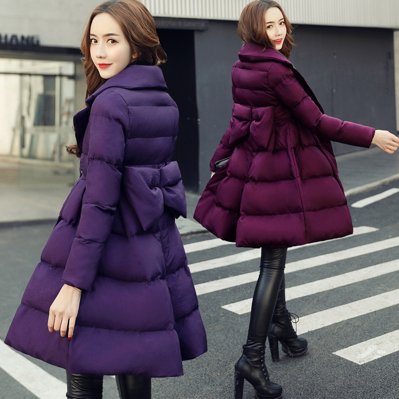 Off-season Korean version of down padded jacket women's mid-length version thickened warm fashion cute wind bow padded jacket with waist and big swing