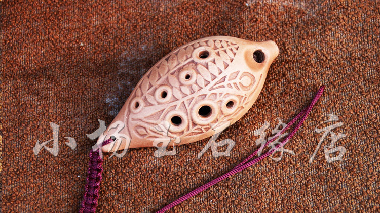 Ningxia special produce ethnic musical instrument Tao Hoon G Tune Mud Wow with a blown description of the method and the sound position