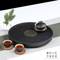 Black gold stone tea tray simple household round Japanese drainage tray Black gold stone small tea table stone hollow big tea sea