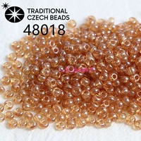 48018 Чешские бусины рисовые 2мм с перламутром и прозрачными 10г, около 1000 шт.