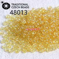 48013 Чешские бусины рисовые с перламутровым и прозрачным диаметром 2мм 10г, около 1000 шт.