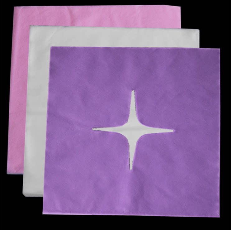 Disposable hole towel beauty salon massage mattress face towel lying pillow towel non-woven bed towel cross hole thickened