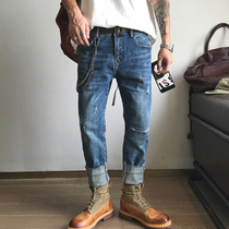 Xu Tailang spring new mens jeans American trend hole slim slim feet rough edge simple joker casual pants