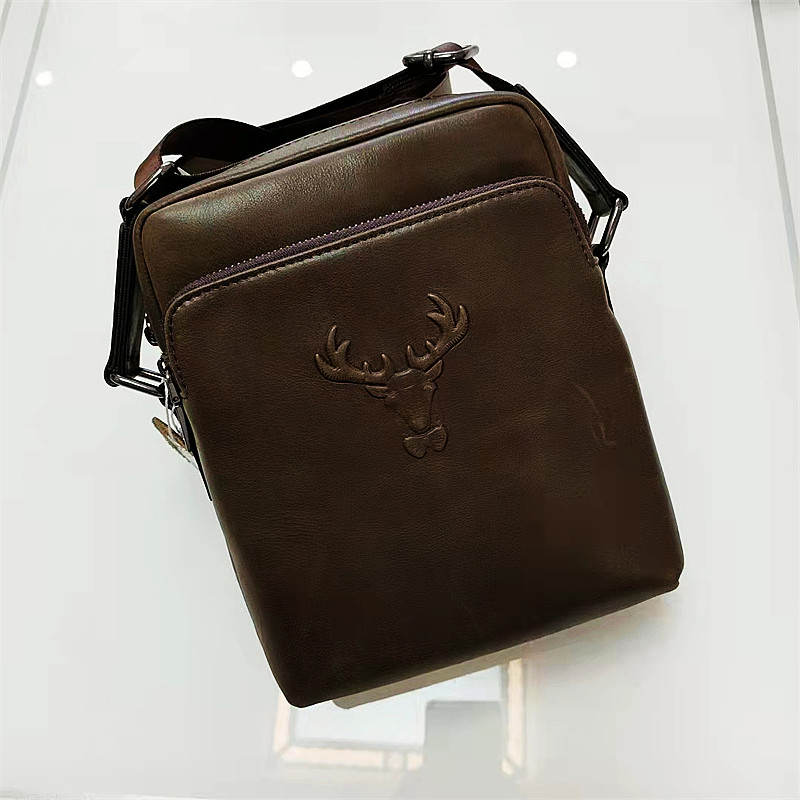 Sports Korean version casual outdoor top layer cowhide messenger bag men's bag men's youth vertical shoulder bag off shoulder bag