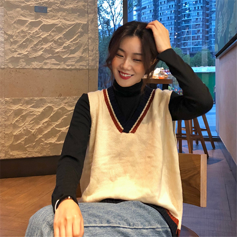 Phiên bản Hàn Quốc của áo gió cổ đại hoang dã không tay vest + áo sơ mi + áo sơ mi cổ lọ + áo len dệt kim chân rộng áo cardigan nữ