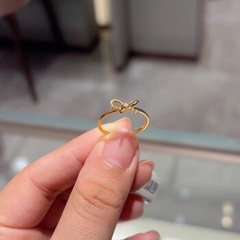 Gold bow ring for women with niche design to show whitening