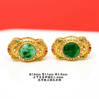 Серебро с золотым покрытием и пряным зеленым жадеитом.