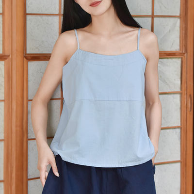 The 2021 summer collection of artistic cotton and linen features a solid color casual loose and versatile Hanfu as the base layer, paired with a women's small halter top