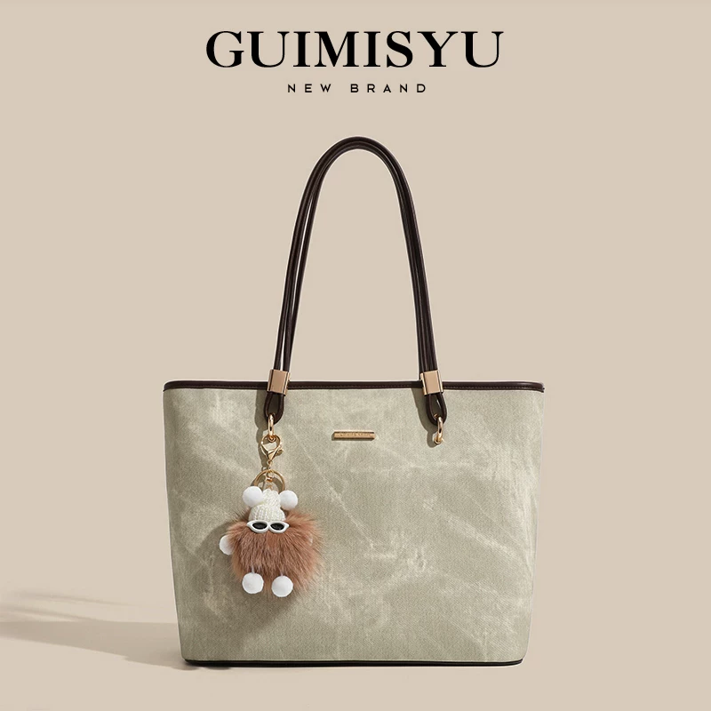 Capacious handheld one-shoulder bag