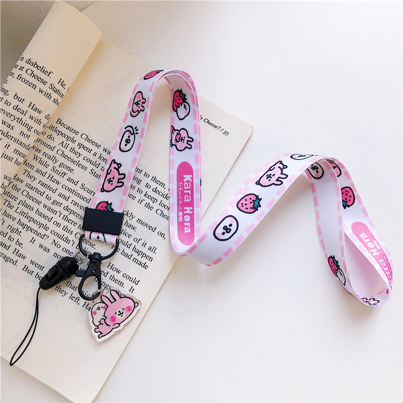 Dễ thương phim hoạt hình điện thoại di động dây vải nữ mở rộng dây treo cổ điện thoại di động chuỗi mặt dây chuyền cá tính sáng tạo chuỗi treo chìa khóa điện thoại di động với dây treo cổ in lưới đỏ chống mất dây đeo cổ tay - Phụ kiện điện thoại di động linh kien dien thoai