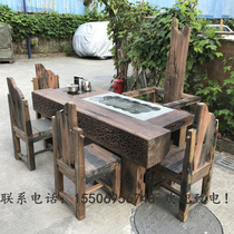 Old boat wood weathered conch hole keel tea table outdoor kung fu tea table original ecological tea table and chair combination solid wood furniture