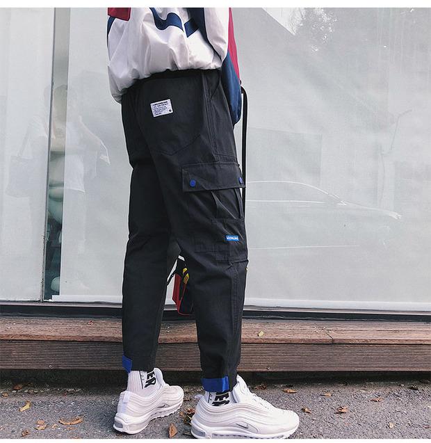 Multi-Pocket ins super fire overalls nam thương hiệu chic chic lỏng lẻo phiên bản Hàn Quốc của xu hướng quần chín điểm giản dị quần jogger nam