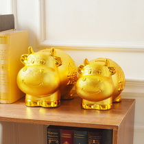 Golden Bull piggy bank can only get in and out of the year of the Ox Piggy bank can only get in and out of the year of the Ox Piggy bank can only get out of the year of the Ox Piggy Bank