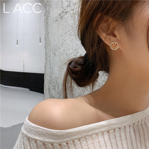 South Korea Dongdaemun hollow smiley face expression earrings female earrings cute small exquisite sterling silver needle do not need to pick it when sleeping