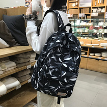 Light rider junior high school college high school student bag female large capacity backpack travel bag fashion trend backpack woman