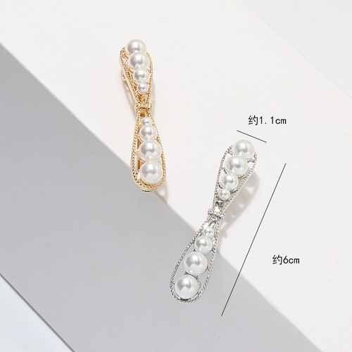 Маленькая элегантная заколка для волос с бантиком