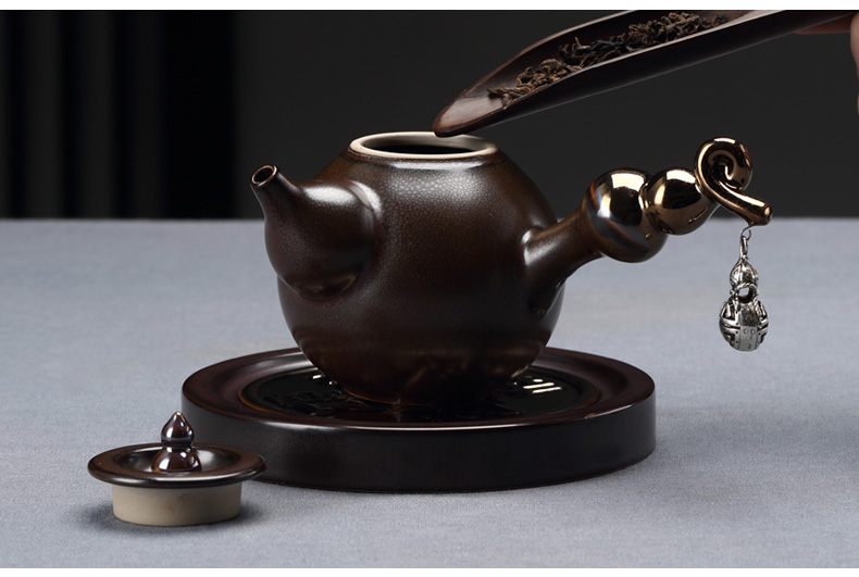 Ceramic teapot suit household creative tea modern kung fu tea tea cups of black small set of simple lazy people