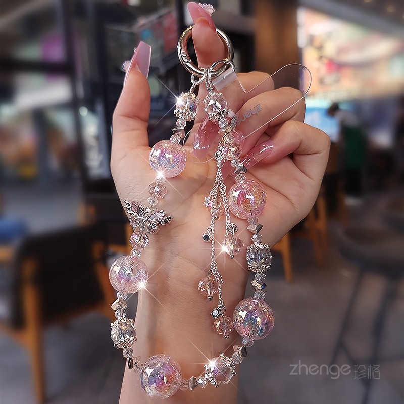 Mobile phone chain butterfly star crystal bead pendant, exquisite handmade beaded wrist jewelry, delicate niche light luxury short style outdoor travel travel anti-loss hand-held chain strap phone case lanyard new product