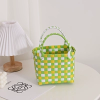 Цветная рука зеленое и желтое