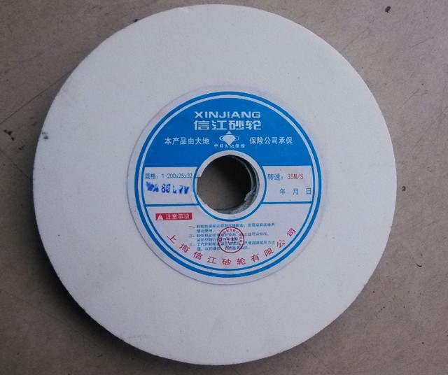 Xinjiang ຖ່ານກ້ອນ corundum grinding wheel ສີຂາວ WA ເຫຼັກ jade ເຫຼັກສີຂາວ jade ເຫຼັກ grinding 350*40*127