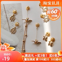 (Exquisite little woman series) small paper crane four-leaf clover flower is really not painful without ear hole mosquito coil ear clip earrings