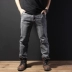 Mùa thu quần jeans nam rộng màu đen co giãn cao ống thẳng cộng với phân bón XL tuổi trung niên béo phì quần thể thao nam Quần jean