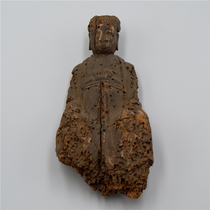 A carved wooden statue of a real Ming Dynasty.