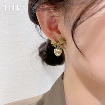 Korea autumn and winter 2021 New Tide fashion wild bow love earrings female niche design sense ear ornaments