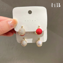 Korean asymmetric exquisite temperament light luxury advanced sense red ear buckle female autumn and winter minority design sense ear stud earrings