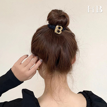 Simple temperament high-end light luxury letter black ball head tied hair rope female autumn and winter temperament hair ring head rope