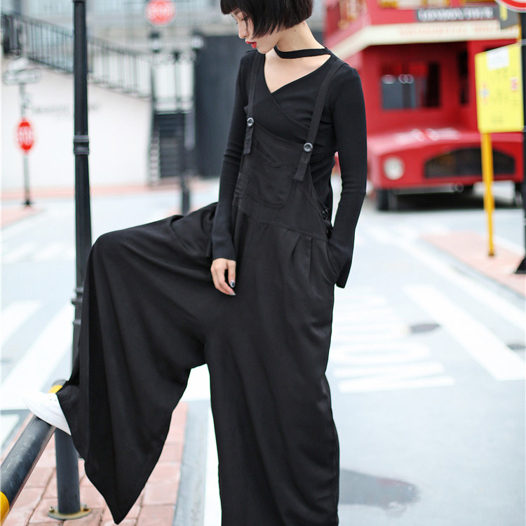 Dark wind Europe station Summer new women's clothing wild new big hems hold baby bags wide leg pants jumpsuit skirt women