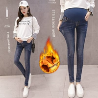 Bà bầu quần jeans mùa đông cộng với nhung ấm chân bút chì quần nhung vàng dày nâng bụng mặc quần mùa đông đầm bầu đẹp