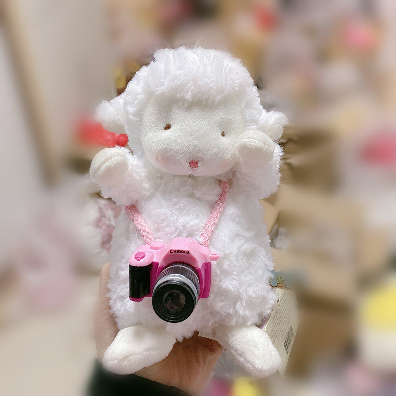 TikTok little sitting sheep bunnies By The Bay lamb doll flash sound card camera backpack decorations
