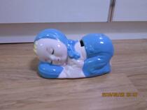 Nostalgic old porcelain little girl sleeping piggy bank Piggy bank toy