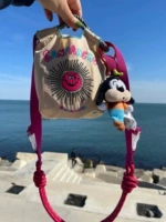 Бежевые розовые бретели на солнечной энергии