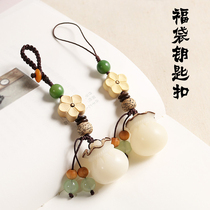 Car key chain hand-woven Bodhi root carving money bag lucky bag Palace Bell Bell creative men and women bag pendant