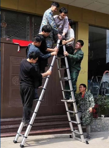 Multi-functional home telescopic ladder folding lifting stairs thickened aluminum alloy engineering ladder herringbone ladder portable