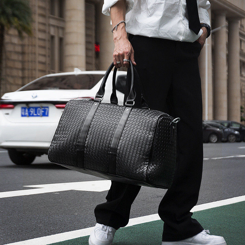 Fashion travel bag men's handheld short trip travel large capacity Europe and America Peel bag bag bag bag bag bag