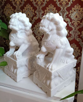 A pair of stone lions watchmen town house White marble carvers with door ornaments Bluestone pier courtyard cemetery ornaments