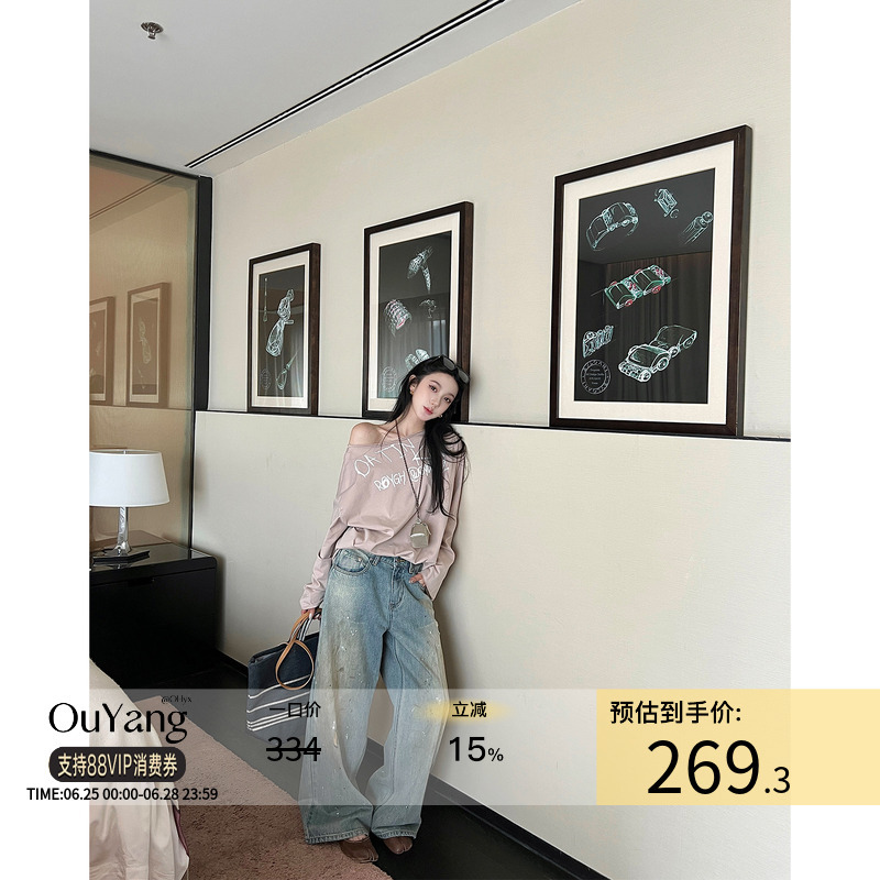 Ouyang Brand Denim Jeans with a Heavy Wash, Distressed Look, and Splatter Ink Design, Low-Rise