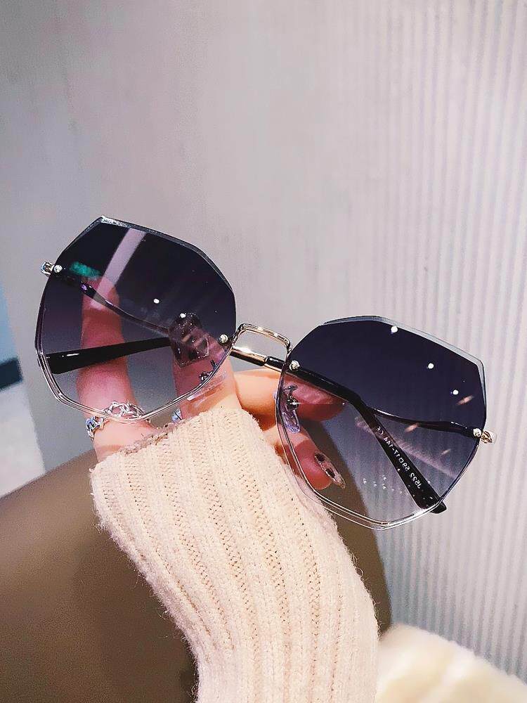 Japan ZD new fashion polygonal frameless sunglasses woman round long face street pat temperament light sunglasses tide