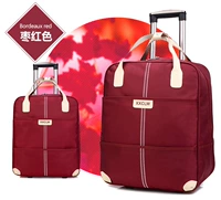 Бордовый чемодан